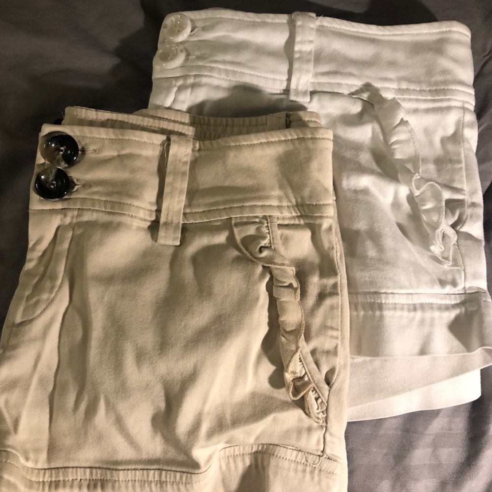 2 Shorts .  2bebe Shorts white and tan